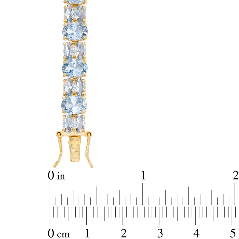 Main Image 2 of Oval Lab-Created Blue Spinel Bracelet in Sterling Silver with 18K Gold Plate - 7.5"