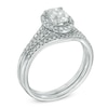 Thumbnail Image 1 of 1-1/6 CT. T.W. Oval Diamond Frame Bridal Set in 14K White Gold