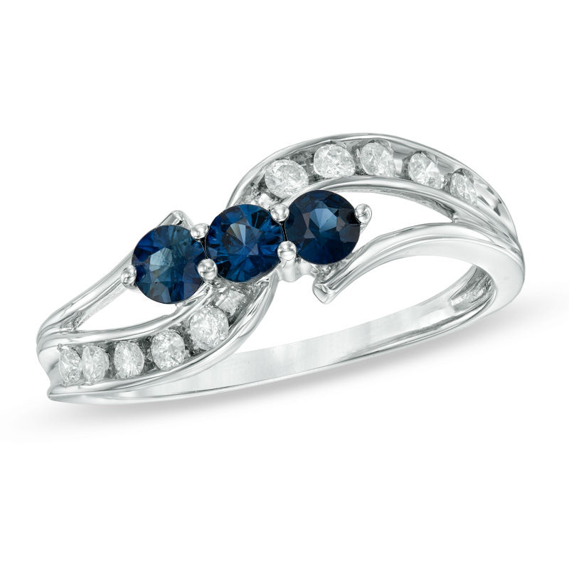 Main Image 1 of Blue Sapphire and 1/5 CT. T.W. Diamond Three Stone Bypass Ring in 10K White Gold