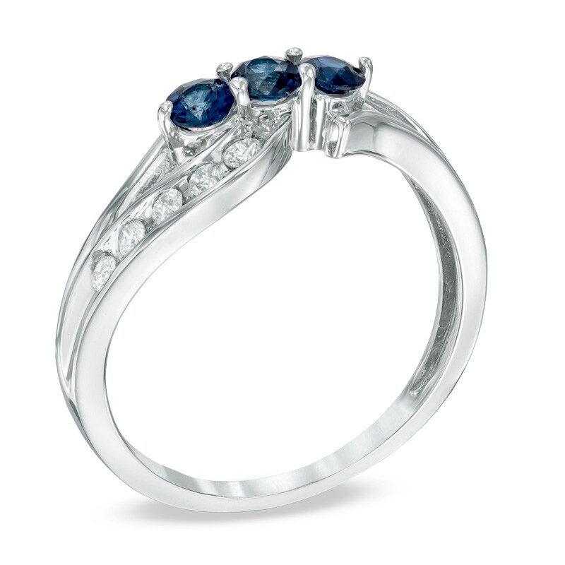Main Image 2 of Blue Sapphire and 1/5 CT. T.W. Diamond Three Stone Bypass Ring in 10K White Gold