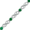 Thumbnail Image 1 of Lab-Created Emerald and 1/20 CT. T.W. Diamond Infinity Bracelet in Sterling Silver - 7.5"