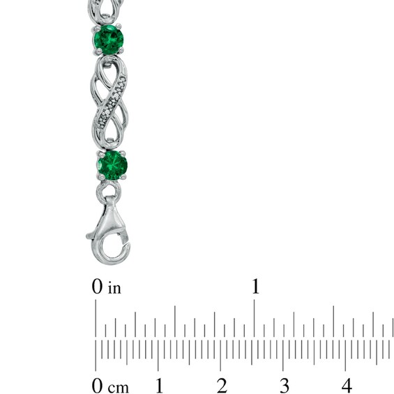 Lab-Created Emerald and 1/20 CT. T.w. Diamond Infinity Bracelet in Sterling Silver - 7.5"