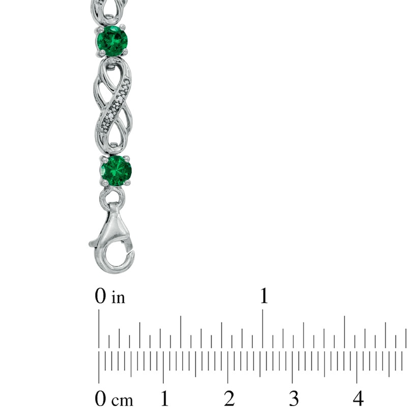 Main Image 2 of Lab-Created Emerald and 1/20 CT. T.W. Diamond Infinity Bracelet in Sterling Silver - 7.5"