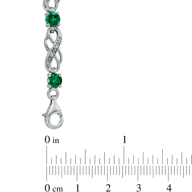 Lab-Created Emerald and 1/20 CT. T.W. Diamond Infinity Bracelet in Sterling Silver - 7.5"