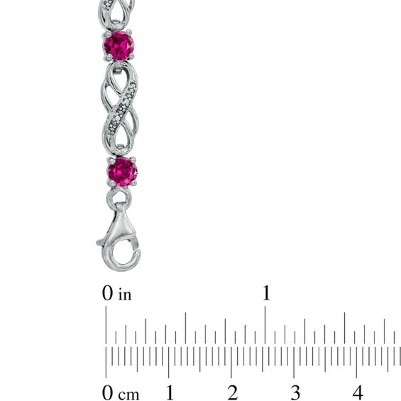 Lab-Created Ruby and 1/20 CT. T.w. Diamond Infinity Bracelet in Sterling Silver - 7.5"