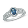 Thumbnail Image 1 of Oval Blue Sapphire and 1/8 CT. T.W. Diamond Leaf Ring in 10K White Gold