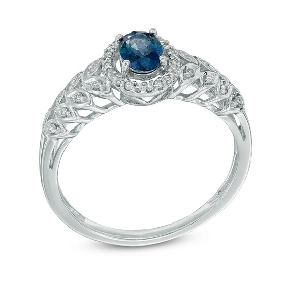 Oval Blue Sapphire and 1/8 CT. T.w. Diamond Leaf Ring in 10K White Gold
