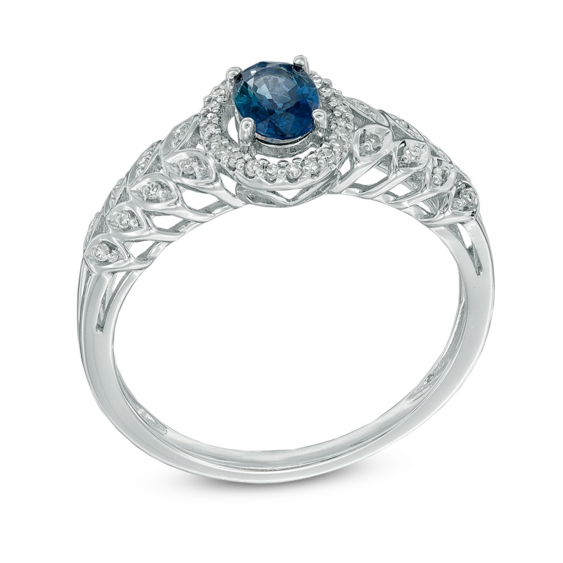 Main Image 2 of Oval Blue Sapphire and 1/8 CT. T.W. Diamond Leaf Ring in 10K White Gold