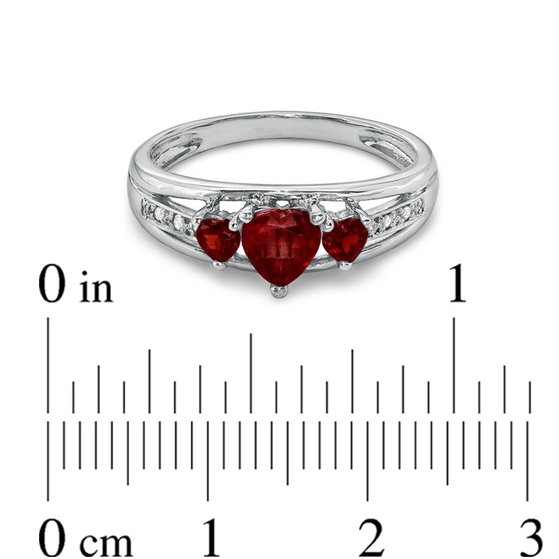 5.0mm Heart-Shaped Garnet and Diamond Accent Three Stone Promise Ring in 10K White Gold