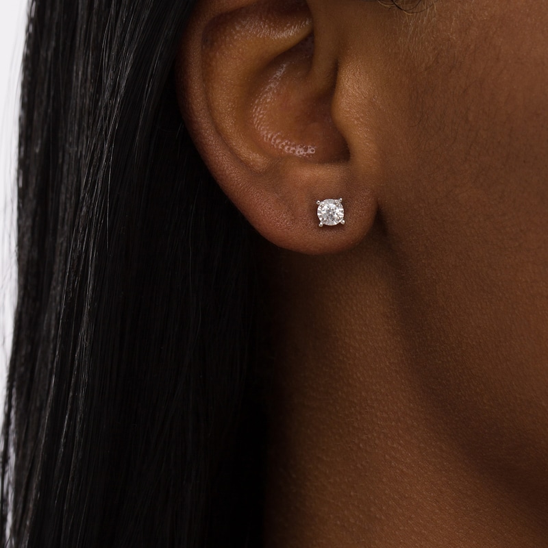 1/4 CT. T.W. Diamond Solitaire Stud Earrings in Sterling Silver (J/I3)