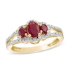 Thumbnail Image 1 of Oval Ruby and Diamond Accent Three Stone Ring in 10K Gold