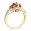 Thumbnail Image 2 of Oval Ruby and Diamond Accent Three Stone Ring in 10K Gold
