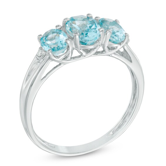 Oval Aquamarine and Diamond Accent Three Stone Ring in 10K White Gold