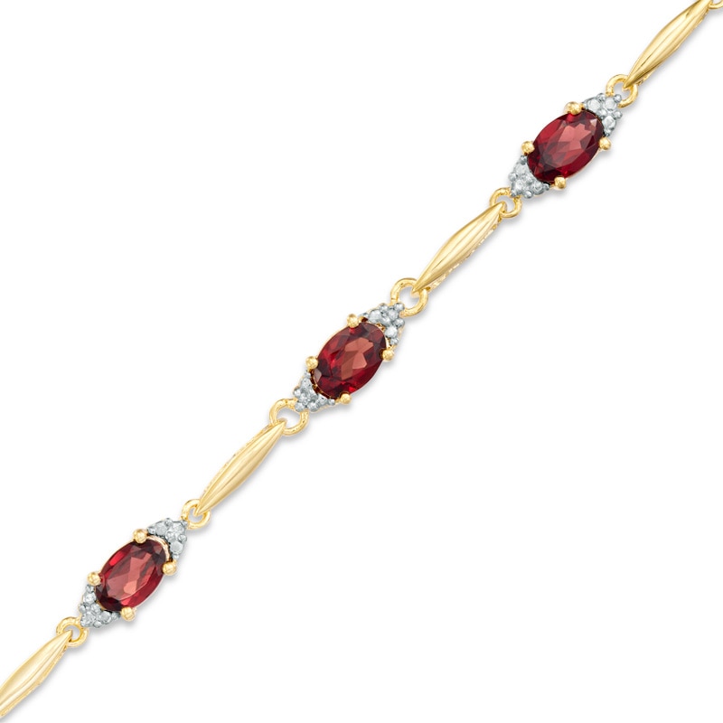 Oval Garnet and Diamond Accent Bracelet in Sterling Silver and 10K Gold Plate - 7.25"