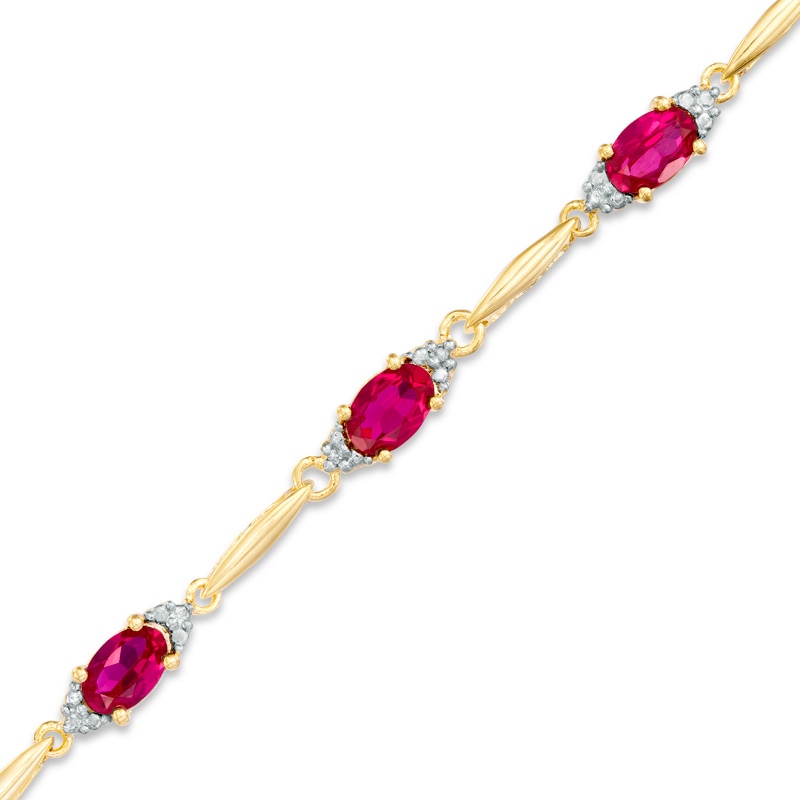 Main Image 1 of Oval Lab-Created Ruby and Diamond Accent Bracelet in Sterling Silver and 10K Gold Plate - 7.25"