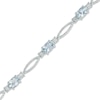 Thumbnail Image 0 of Oval Aquamarine and Diamond Accent Bracelet in Sterling Silver - 7.25"