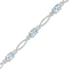 Thumbnail Image 1 of Oval Aquamarine and Diamond Accent Bracelet in Sterling Silver - 7.25"