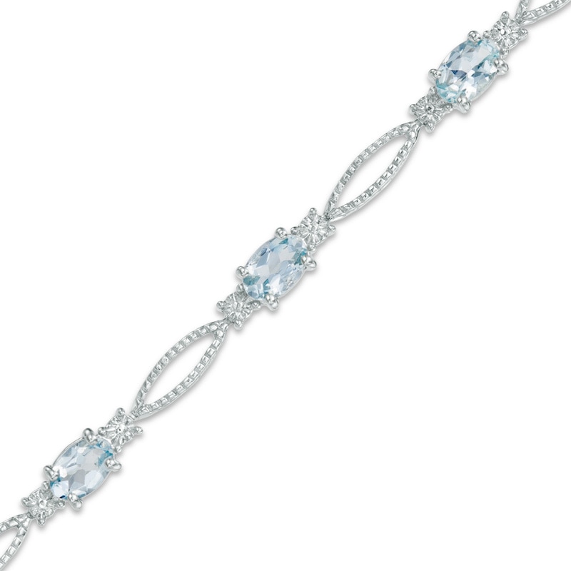 Main Image 1 of Oval Aquamarine and Diamond Accent Bracelet in Sterling Silver - 7.25"