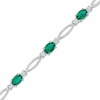 Thumbnail Image 0 of Oval Lab-Created Emerald and Diamond Accent Bracelet in Sterling Silver - 7.25"