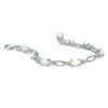 Thumbnail Image 1 of Oval Lab-Created Opal and Diamond Accent Bracelet in Sterling Silver - 7.25"