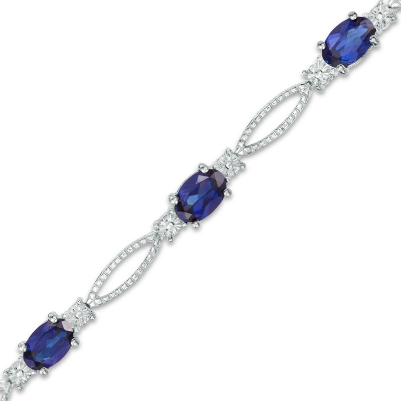 Main Image 1 of Oval Lab-Created Blue Sapphire and Diamond Accent Bracelet in Sterling Silver - 7.25&quot;