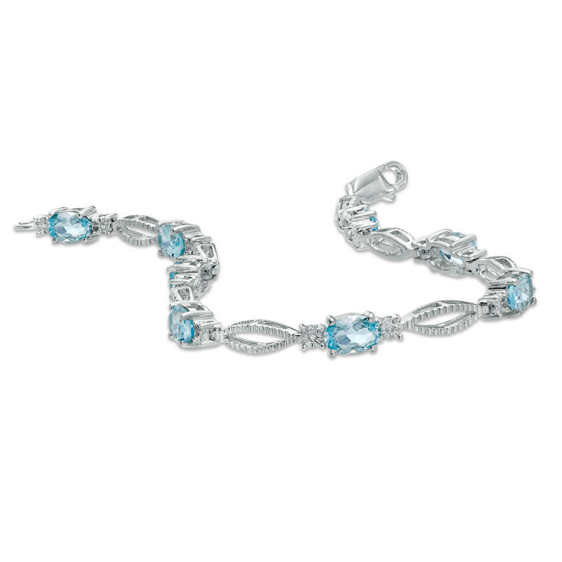 Oval Blue Topaz and Diamond Accent Bracelet in Sterling Silver - 7.25"