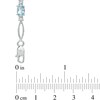 Thumbnail Image 2 of Oval Blue Topaz and Diamond Accent Bracelet in Sterling Silver - 7.25"