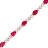 Thumbnail Image 1 of Oval Lab-Created Ruby and Diamond Accent Bracelet in Sterling Silver with 10K Rose Gold Plate - 7.25&quot;