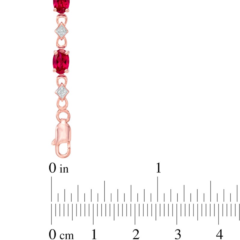 Main Image 2 of Oval Lab-Created Ruby and Diamond Accent Bracelet in Sterling Silver with 10K Rose Gold Plate - 7.25&quot;