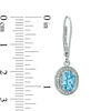 Thumbnail Image 1 of Oval Blue Topaz and Diamond Accent Frame Drop Earrings in Sterling Silver