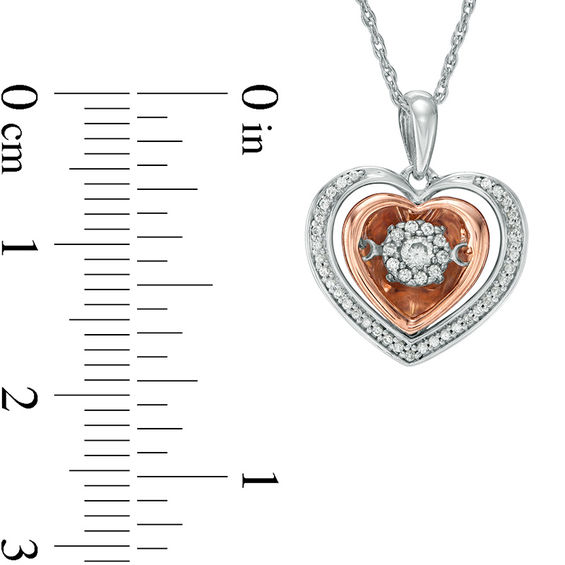 1/5 CT. T.w. Diamond Double Heart Pendant in 10K Two-Tone Gold