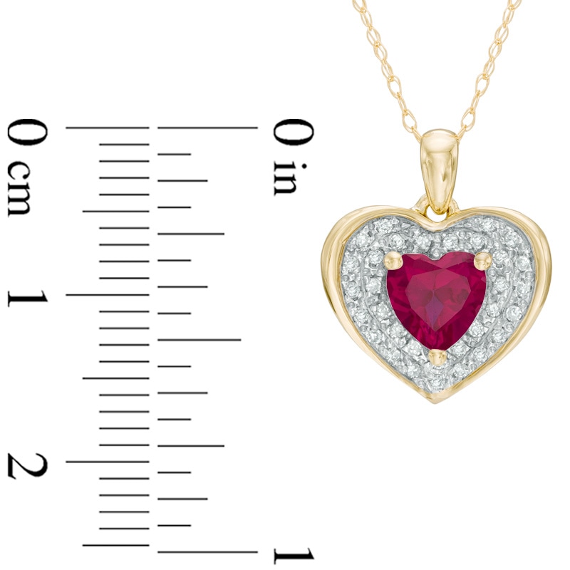 6.0mm Heart-Shaped Lab-Created Ruby and 1/8 CT. T.W. Diamond Frame Heart Pendant in 10K Gold