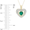 Thumbnail Image 1 of 5.0mm Heart-Shaped Lab-Created Emerald and 1/8 CT. T.W. Diamond Frame Heart Pendant in 10K Gold