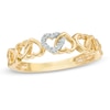 Thumbnail Image 0 of 1/20 CT. T.W. Diamond Alternating Hearts Ring in 10K Gold