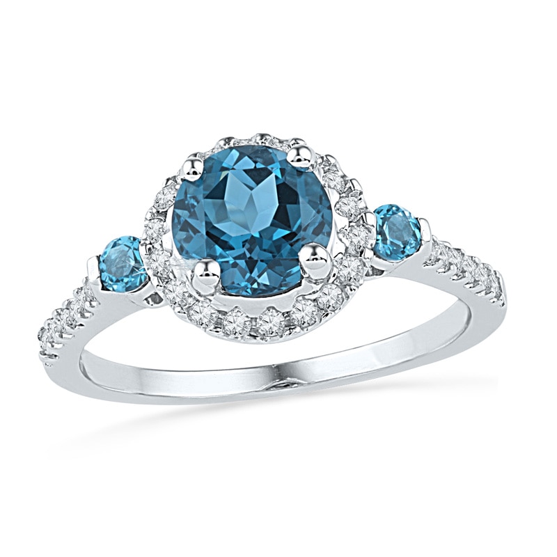 7.0mm Blue Topaz and 1/5 CT. T.W. Diamond Frame Ring in Sterling Silver