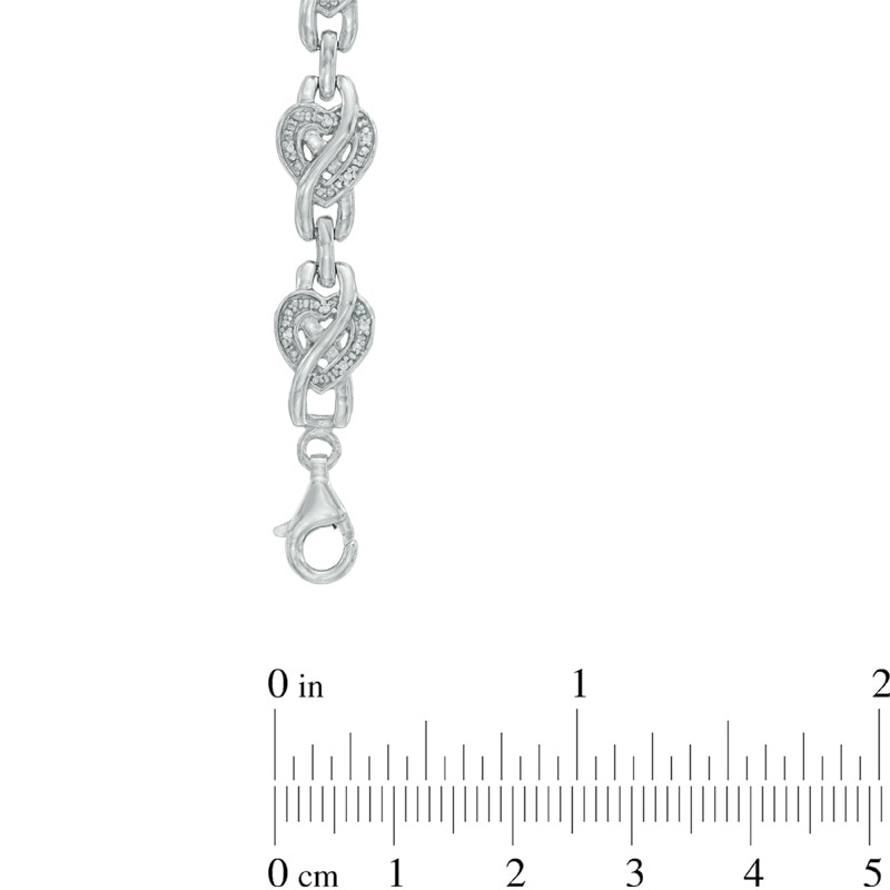 1/10 CT. T.W. Diamond Infinity Overlay Heart Link Bracelet in Sterling Silver - 7.5"