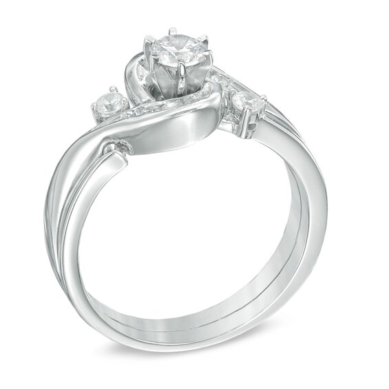 1/2 CT. T.w. Diamond Frame Bypass Bridal Set in 10K White Gold