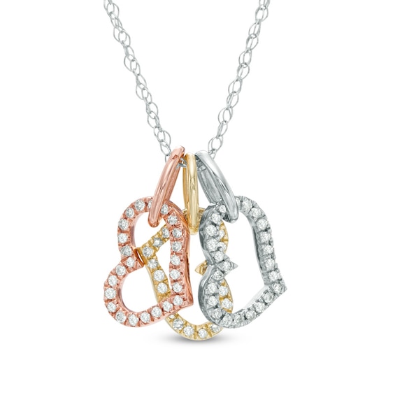 1/10 CT. T.w. Diamond Tilted Triple Heart Pendant in 10K Tri-Tone Gold