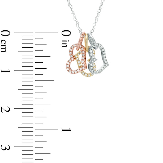 1/10 CT. T.w. Diamond Tilted Triple Heart Pendant in 10K Tri-Tone Gold