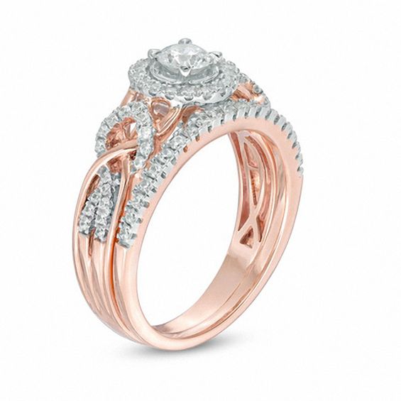 3/4 CT. T.w. Diamond Frame Braided Infinity Bridal Set in 14K Two-Tone Gold