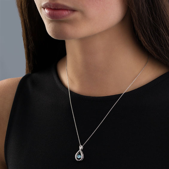 4.5mm Swiss Blue Topaz and Lab-Created White Sapphire Infinity Pendant in Sterling Silver