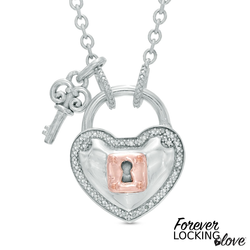 1/10 Ct. T.W. Diamond Heart Lock and Key Dangle Charm Bracelet