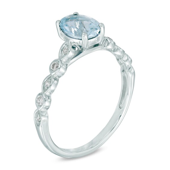 Oval Aquamarine and Diamond Accent Engagement Ring in 14K White Gold