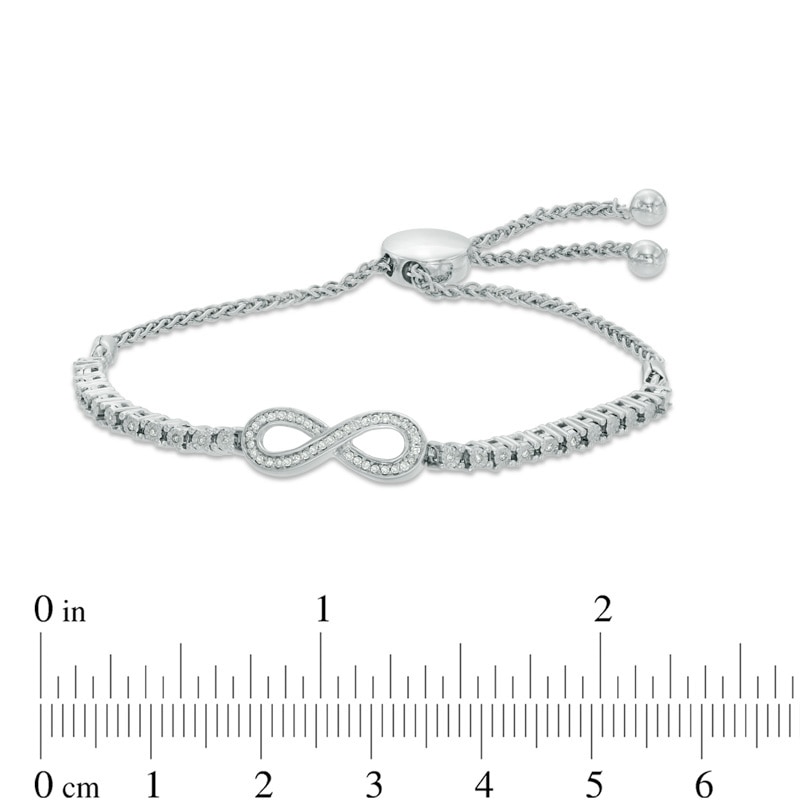 1/6 CT. T.W. Diamond Infinity Loop Adjustable Bolo Bracelet in Sterling Silver - 9.5"