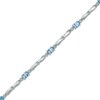 Thumbnail Image 1 of Oval Swiss Blue Topaz and Diamond Accent Bracelet in Sterling Silver