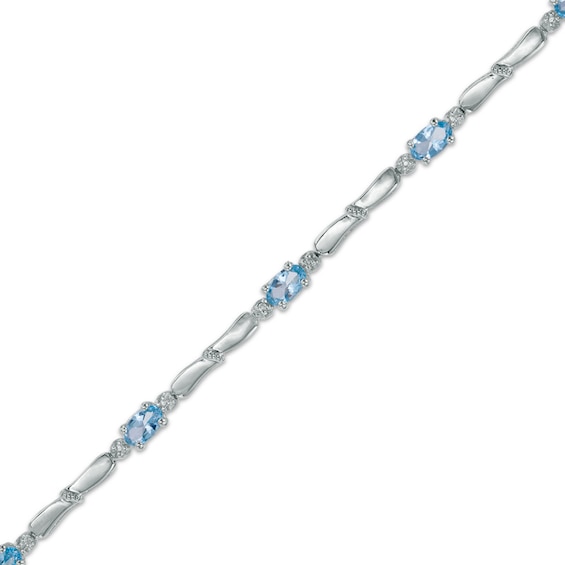 Oval Swiss Blue Topaz and Diamond Accent Bracelet in Sterling Silver