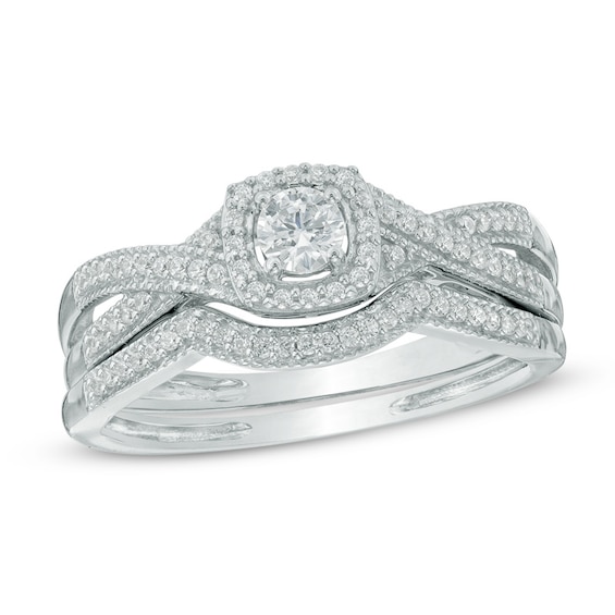 1/3 CT. T.w. Diamond Cushion Frame Twisted Shank Bridal Set in 10K White Gold