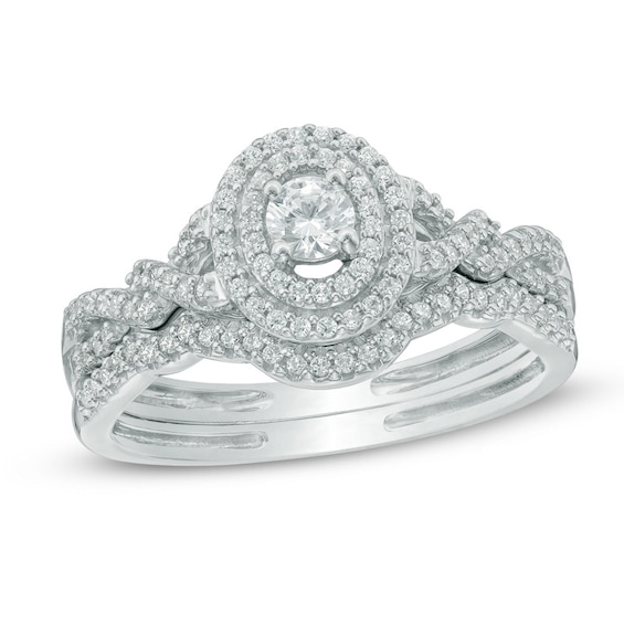 1/2 CT. T.w. Diamond Oval Frame Loose Braid Bridal Set In 10K White Gold