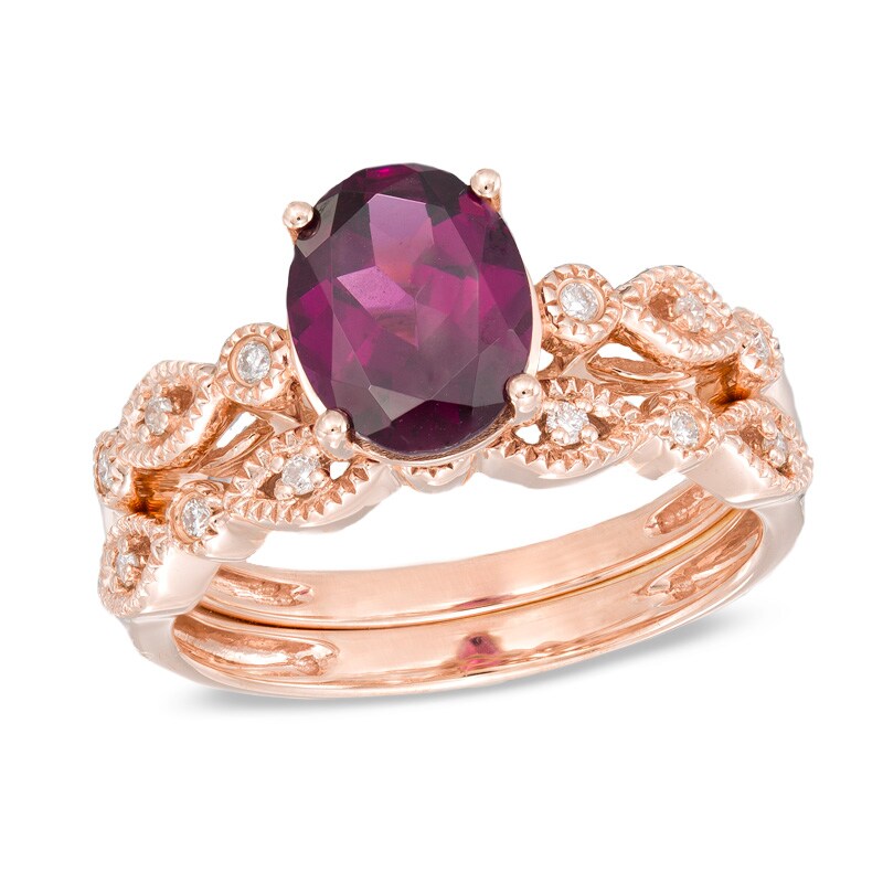 Main Image 1 of Oval Rhodolite Garnet and 1/10 CT. T.W. Diamond Vintage-Style Bridal Set in 14K Rose Gold