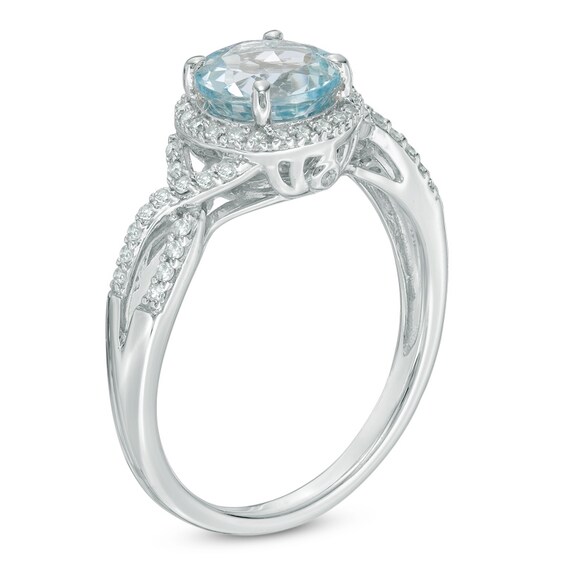 7.0mm Aquamarine and 1/6 CT. T.w. Diamond Frame Engagement Ring in 10K White Gold